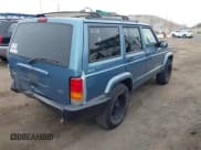 ✅ 1999 Jeep Cherokee Sport • VIN: 1J4FF68S7XL513640 • Lot: 42913382. Listed on IAAI with 207,133 mi. Free auction sales archive from the USA and detailed vehicle history report at DreamBid. Image 4.