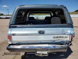 1987 Chevrolet Blazer z VIN 1GNEV18K7HF180306, wystawiony jako Copart lot #80914465 z przebiegiem 455 897 mil mil oraz Nie do naprawy • Non repairable. Historia ofert i sprzedaży dostępna na DreamBid. Obrazek 6.