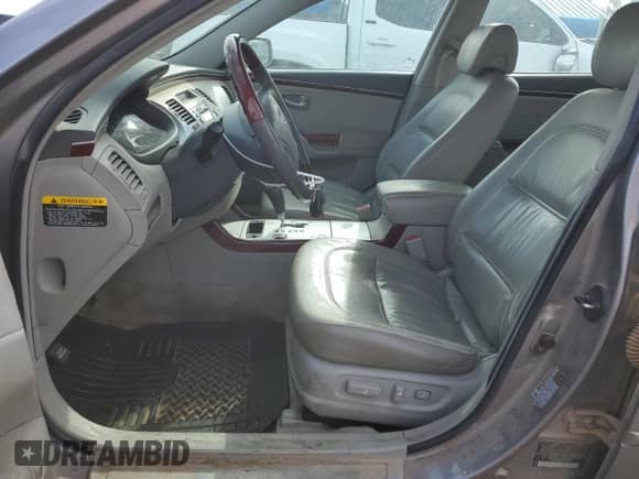 2007 Hyundai Azera SE с VIN KMHFC46F47A166915, выставлен на аукционе Copart как лот 88978785 с пробегом Не указан миль и Списание • Salvage title. История ставок и продаж доступна на DreamBid. Изображение 7.