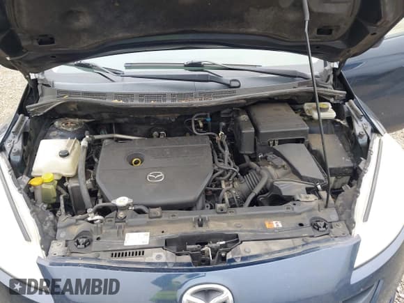 ✅ 2015 Mazda 5 Sport • VIN: JM1CW2BL2F0180279 • Lot: 43775420. Listed on IAAI with 213,622 mi. Free auction sales archive from the USA and detailed vehicle history report at DreamBid. Image 10.