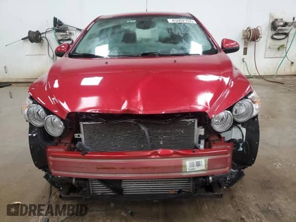 2012 Chevrolet Sonic LT z VIN 1G1JC5SB7C4222161, wystawiony jako Copart lot #45002765 z przebiegiem 94 450 mil mil oraz Czysty tytuł • Clean title. Historia ofert i sprzedaży dostępna na DreamBid. Obrazek 5.