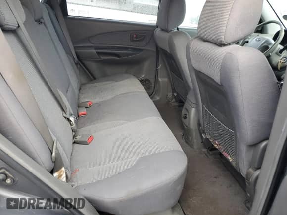 2007 Hyundai Tucson GLS z VIN KM8JM12BX7U547952, wystawiony jako Copart lot #80163754 z przebiegiem 268 582 mil mil oraz Czysty tytuł • Clean title. Historia ofert i sprzedaży dostępna na DreamBid. Obrazek 11.