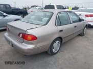 ✅ 1998 Toyota Corolla CE • VIN: 1NXBR12E7WZ076552 • Lot: 43885862. Listed on IAAI with 153,374 mi. Free auction sales archive from the USA and detailed vehicle history report at DreamBid. Image 4.