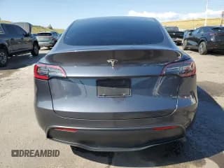 ✅ 2023 Tesla Model Y • VIN: 7SAYGDEDXPF949555 • Lot: 82127525. Listed on Copart with 108,750 mi. Free auction sales archive from the USA and detailed vehicle history report at DreamBid. Image 6.