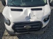 ✅ 2020 Ford Transit Passenger XL • VIN: 1FBAX2C85LKA65128 • Lot: 81118815. Listed on Copart with 82,443 mi. Free auction sales archive from the USA and detailed vehicle history report at DreamBid. Image 12.