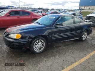 ✅ 2001 Pontiac Grand Am • VIN: 1G2NF12T71M540199 • Лот: 58686335. Опубликован ранее на Copart с пробегом 110 886 миль. Бесплатный доступ к архиву аукционных продаж из США и подробный отчёт об истории автомобиля на DreamBid. Изображение 1.