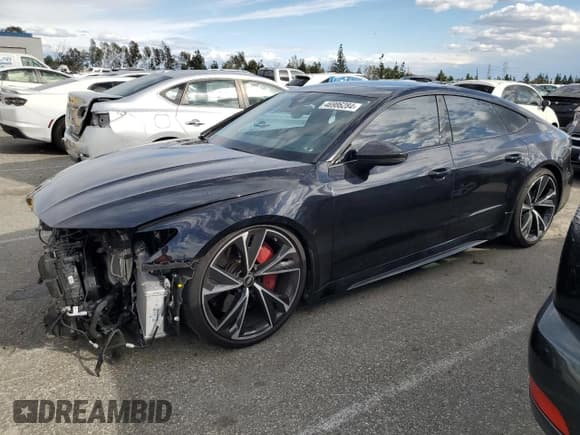 ✅ 2021 Audi RS 7 • VIN: WUAPCBF25MN907879 • Lot: 46986284. Listed on Copart with 23,001 mi. Free auction sales archive from the USA and detailed vehicle history report at DreamBid. Image 1.