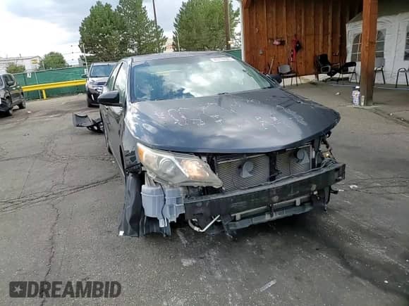 2014 Toyota Camry L with VIN 4T1BF1FK4EU304191, listed as a Copart auction lot 70778585 with 176,301 mi miles and Salvage title. Bid and sale history available at DreamBid. Image 14.