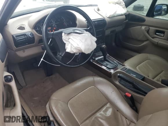 ✅ 1999 BMW Z3 2.8 • VIN: 4USCH3331XLF70334 • Лот: 84403104. Опубликован ранее на Copart с пробегом 78 273 миль. Бесплатный доступ к архиву аукционных продаж из США и подробный отчёт об истории автомобиля на DreamBid. Изображение 8.