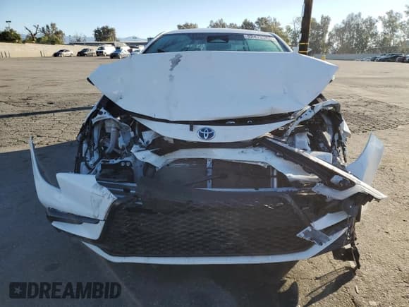 ✅ 2024 Toyota Corolla Hybrid SE • VIN: JTDBCMFE8R3034886 • Лот: 82472065. Опубликован ранее на Copart с пробегом 41 291 миль. Бесплатный доступ к архиву аукционных продаж из США и подробный отчёт об истории автомобиля на DreamBid. Изображение 5.