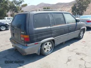 ✅ 1998 Mazda MPV • VIN: JM3LV5226W0834770 • Lot: 42903638. Wystawiony na IAAI z przebiegiem 211 675 mil. Bezpłatny archiwum sprzedaży aukcyjnych z USA i szczegółowy raport historii pojazdu na DreamBid. Zdjęcie 4.