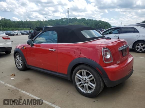 ✅ 2013 MINI Roadster • VIN: WMWSY1C5XDT429260 • Lot: 57219935. Listed on Copart with 129,719 mi. Free auction sales archive from the USA and detailed vehicle history report at DreamBid. Image 2.