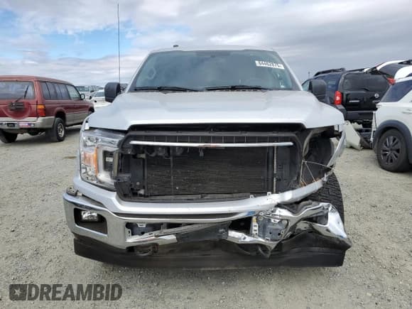 ✅ 2018 Ford F-150 XLT • VIN: 1FTEW1E57JKE80297 • Lot: 84462875. Listed on Copart with 126,670 mi. Free auction sales archive from the USA and detailed vehicle history report at DreamBid. Image 5.