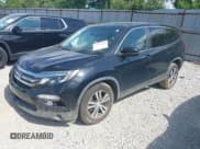 ✅ 2017 Honda Pilot EX-L • VIN: 5FNYF6H50HB083964 • Lot: 42658688. Listed on IAAI with 128,689 mi. Free auction sales archive from the USA and detailed vehicle history report at DreamBid. Image 18.