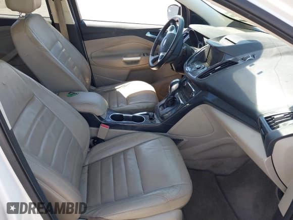 ✅ 2015 Ford Escape Titanium • VIN: 1FMCU0J91FUA50191 • Lot: 42219288. Listed on IAAI with 159,886 mi. Free auction sales archive from the USA and detailed vehicle history report at DreamBid. Image 5.