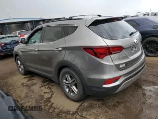 ✅ 2018 Hyundai Santa Fe 2.4L • VIN: 5NMZUDLB4JH067122 • Лот: 63310903. Опубликован ранее на Copart с пробегом 88 561 миль. Бесплатный доступ к архиву аукционных продаж из США и подробный отчёт об истории автомобиля на DreamBid. Изображение 2.