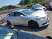 ✅ 2013 Ford Fusion SE Hybrid • VIN: 3FA6P0LU5DR336582 • Lot: 42833472. Listed on IAAI with 149,824 mi. Free auction sales archive from the USA and detailed vehicle history report at DreamBid. Image 13.