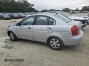 ✅ 2006 Hyundai Accent GLS • VIN: KMHCN46C06U047601 • Лот: 41873365. Опубликован ранее на Copart с пробегом 163 812 миль. Бесплатный доступ к архиву аукционных продаж из США и подробный отчёт об истории автомобиля на DreamBid. Изображение 2.