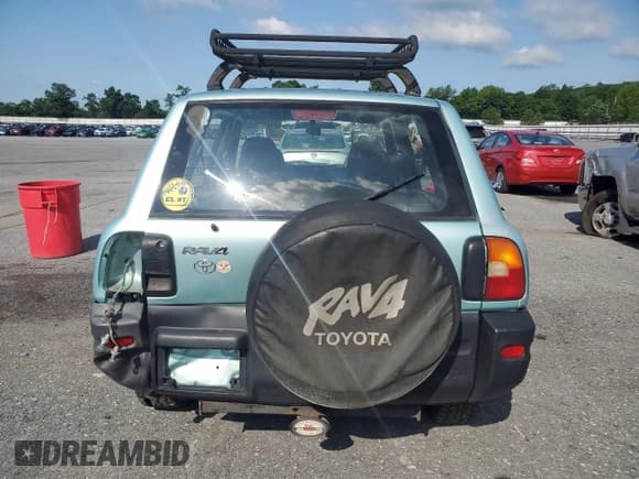 ✅ 1997 Toyota RAV4 • VIN: JT3HP10VXV7030982 • Lot: 61766055. Wystawiony na Copart z przebiegiem 215 866 mil. Bezpłatny archiwum sprzedaży aukcyjnych z USA i szczegółowy raport historii pojazdu na DreamBid. Zdjęcie 6.