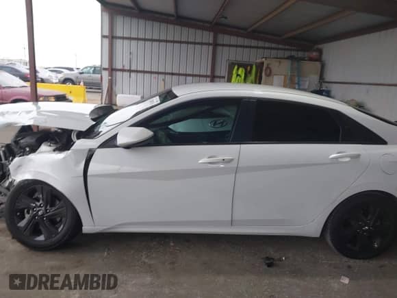 2021 Hyundai Elantra SEL z VIN 5NPLM4AG8MH027931, wystawiony jako IAAI lot #43288535 z przebiegiem 86 292 mil mil oraz . Historia ofert i sprzedaży dostępna na DreamBid. Obrazek 14.