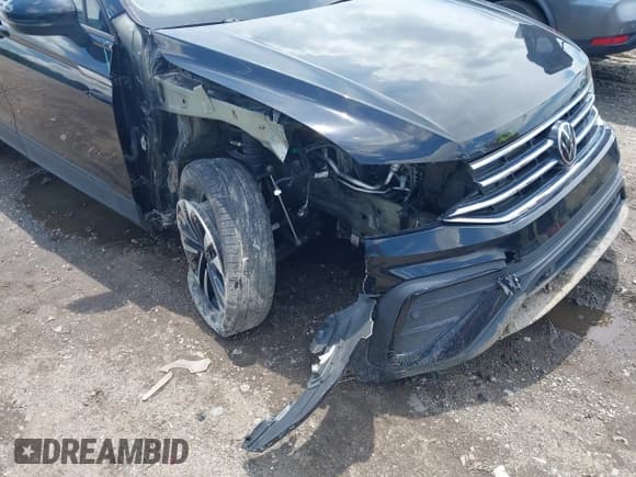 ✅ 2023 Volkswagen Tiguan S • VIN: 3VVRB7AX0PM047141 • Lot: 42524650. Listed on IAAI with 41,765 mi. Free auction sales archive from the USA and detailed vehicle history report at DreamBid. Image 18.