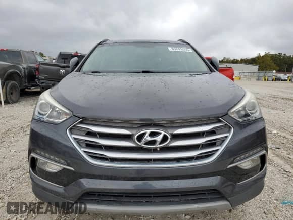 2018 Hyundai Santa Fe 2.4L z VIN 5XYZU3LB7JG543240, wystawiony jako Copart lot #89693095 z przebiegiem 121 636 mil mil oraz Czysty tytuł • Clean title. Historia ofert i sprzedaży dostępna na DreamBid. Obrazek 5.