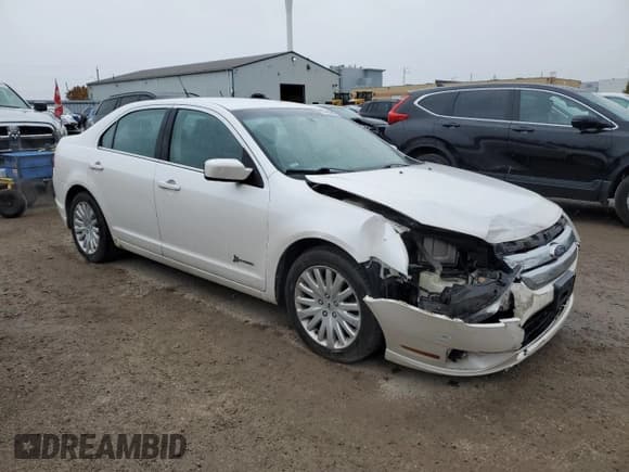 ✅ 2011 Ford Fusion Hybrid • VIN: 3FADP0L38BR192960 • Lot: 91322865. Wystawiony na Copart z przebiegiem 211 342 mil. Bezpłatny archiwum sprzedaży aukcyjnych z USA i szczegółowy raport historii pojazdu na DreamBid. Zdjęcie 4.