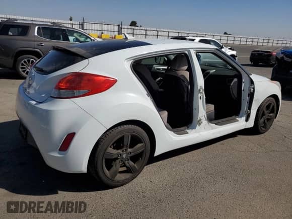 2014 Hyundai Veloster с VIN KMHTC6AD1EU215147, выставлен на аукционе Copart как лот 73018944 с пробегом 108 433 миль миль и Списание • Salvage title. История ставок и продаж доступна на DreamBid. Изображение 3.