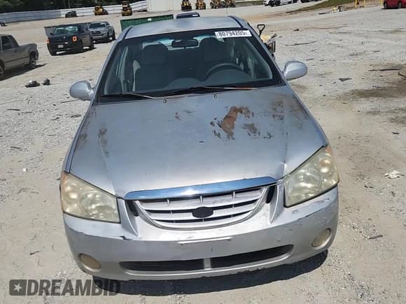 ✅ 2005 Kia Spectra LX • VIN: KNAFE121255097281 • Lot: 80794205. Wystawiony na Copart z przebiegiem 155 400 mil. Bezpłatny archiwum sprzedaży aukcyjnych z USA i szczegółowy raport historii pojazdu na DreamBid. Zdjęcie 13.