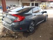 ✅ 2018 Honda Civic EX-T • VIN: JHMFC1F35JX021667 • Lot: 43778970. Listed on IAAI with 159,063 mi. Free auction sales archive from the USA and detailed vehicle history report at DreamBid. Image 4.