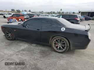 2016 Dodge Challenger SRT 392 с VIN 2C3CDZDJXGH331929, выставлен на аукционе Copart как лот 81610275 с пробегом 64 882 миль миль и Списание • Salvage title. История ставок и продаж доступна на DreamBid. Изображение 2.