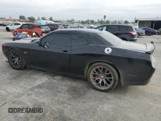✅ 2016 Dodge Challenger SRT 392 • VIN: 2C3CDZDJXGH331929 • Lot: 81610275. Wystawiony na Copart z przebiegiem 64 882 mil. Bezpłatny archiwum sprzedaży aukcyjnych z USA i szczegółowy raport historii pojazdu na DreamBid. Zdjęcie 2.
