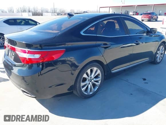 2013 Hyundai Azera с VIN KMHFG4JG3DA257044, выставлен на аукционе IAAI как лот 38729391 с пробегом 121 101 миль миль и . История ставок и продаж доступна на DreamBid. Изображение 4.