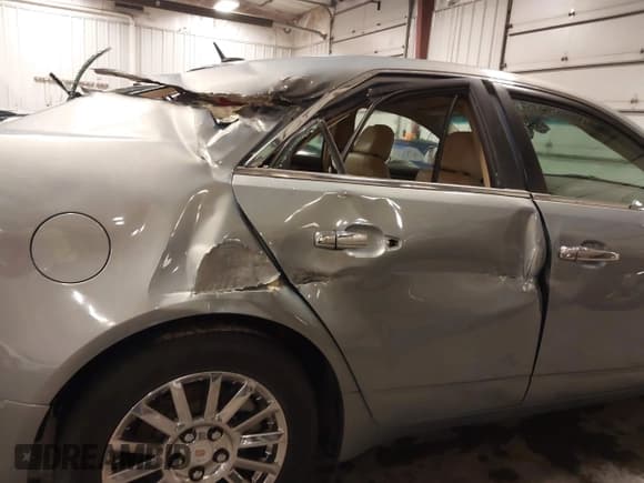 ✅ 2008 Cadillac CTS AWD • VIN: 1G6DG577X80137734 • Лот: 41608152. Опубликован ранее на IAAI с пробегом 94 376 миль. Бесплатный доступ к архиву аукционных продаж из США и подробный отчёт об истории автомобиля на DreamBid. Изображение 17.