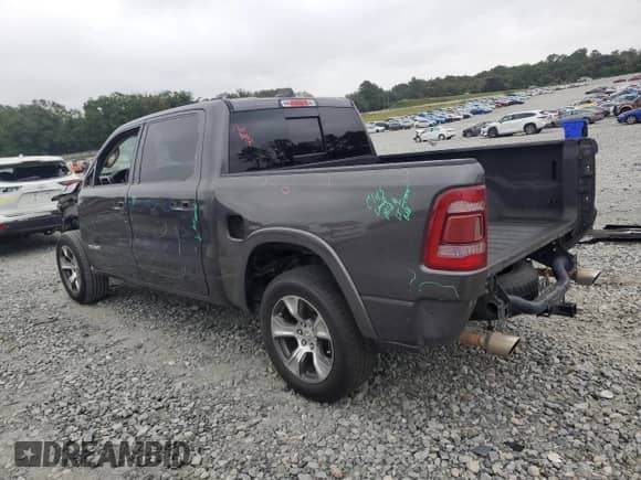 2019 Ram 1500 Laramie с VIN 1C6SRFJT0KN587839, выставлен на аукционе Copart как лот 81923715 с пробегом 172 305 миль миль и Списание • Salvage title. История ставок и продаж доступна на DreamBid. Изображение 2.