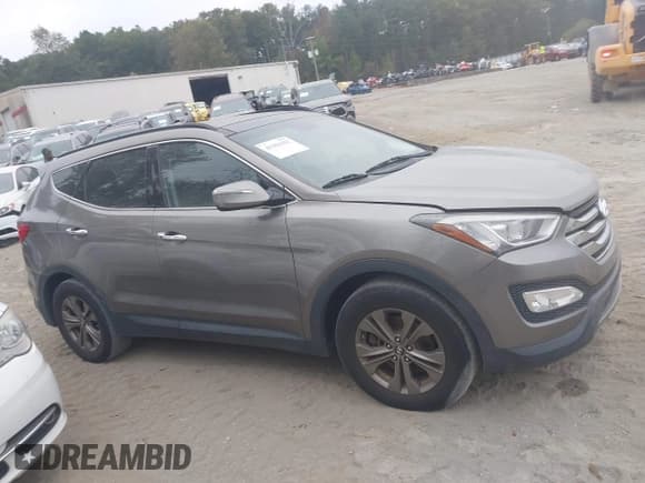 ✅ 2014 Hyundai Santa Fe • VIN: 5XYZUDLB0EG150479 • Lot: 43361152. Listed on IAAI with 163,969 mi. Free auction sales archive from the USA and detailed vehicle history report at DreamBid. Image 13.