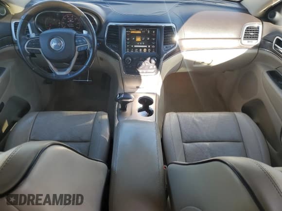 ✅ 2014 Jeep Grand Cherokee Overland • VIN: 1C4RJFCT9EC147999 • Lot: 89689645. Listed on Copart with 133,640 mi. Free auction sales archive from the USA and detailed vehicle history report at DreamBid. Image 8.