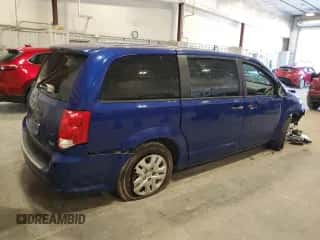 2019 Dodge Grand Caravan SE z VIN 2C4RDGBG4KR729271, wystawiony jako Copart lot #82603105 z przebiegiem 126 478 mil mil oraz Czysty tytuł • Clean title. Historia ofert i sprzedaży dostępna na DreamBid. Obrazek 3.