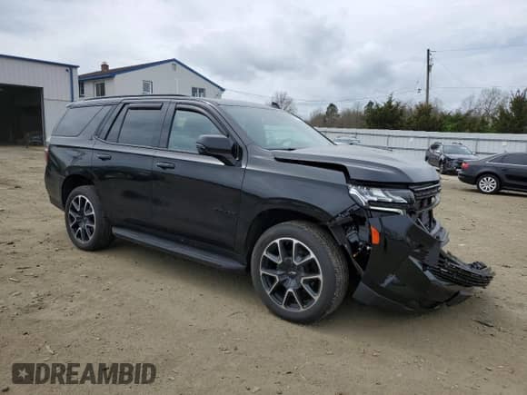 2022 Chevrolet Tahoe RST with VIN 1GNSKRKDXNR134502, listed as a Copart auction lot 50757764 with 25,434 mi miles and Salvage title. Bid and sale history available at DreamBid. Image 4.