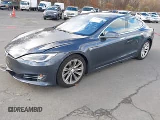 ✅ 2016 Tesla Model S 90D • VIN: 5YJSA1E23GF154185 • Lot: 43673264. Listed on IAAI with 68,137 mi. Free auction sales archive from the USA and detailed vehicle history report at DreamBid. Image 2.