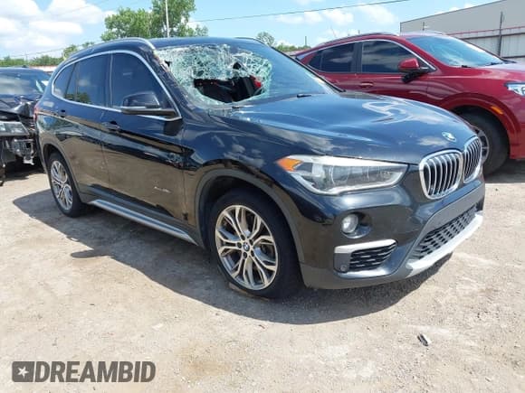 ✅ 2017 BMW X1 xDrive28i • VIN: WBXHT3Z31H4A52403 • Лот: 42565421. Опубликован ранее на IAAI с пробегом 95 031 миль. Бесплатный доступ к архиву аукционных продаж из США и подробный отчёт об истории автомобиля на DreamBid. Изображение 1.