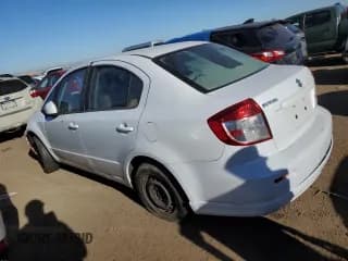 ✅ 2012 Suzuki SX4 LE • VIN: JS2YC5A38C6304913 • Лот: 72880754. Опубликован ранее на Copart с пробегом Не указан. Бесплатный доступ к архиву аукционных продаж из США и подробный отчёт об истории автомобиля на DreamBid. Изображение 2.