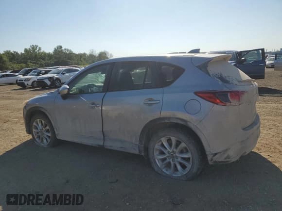 ✅ 2014 Mazda CX-5 Grand Touring • VIN: JM3KE4DY1E0426327 • Лот: 70492415. Опубликован ранее на Copart с пробегом 177 180 миль. Бесплатный доступ к архиву аукционных продаж из США и подробный отчёт об истории автомобиля на DreamBid. Изображение 2.