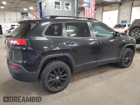✅ 2014 Jeep Cherokee Latitude • VIN: 1C4PJMCS0EW294973 • Lot: 93135185. Listed on Copart with 125,392 mi. Free auction sales archive from the USA and detailed vehicle history report at DreamBid. Image 3.