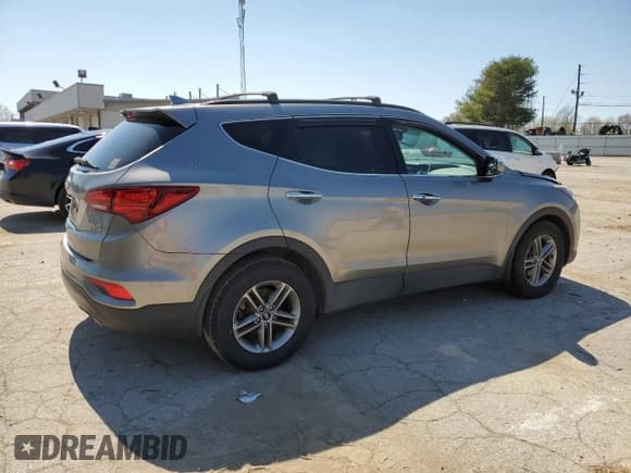 ✅ 2018 Hyundai Santa Fe 2.4L • VIN: 5NMZUDLB1JH063514 • Лот: 46980103. Опубликован ранее на Copart с пробегом 74 586 миль. Бесплатный доступ к архиву аукционных продаж из США и подробный отчёт об истории автомобиля на DreamBid. Изображение 3.