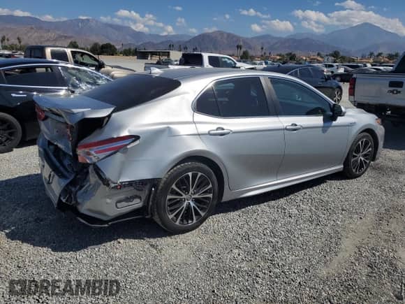 2020 Toyota Camry Hybrid SE с VIN 4T1G31AK7LU012960, выставлен на аукционе Copart как лот 83838075 с пробегом 63 019 миль миль и Списание • Salvage title. История ставок и продаж доступна на DreamBid. Изображение 3.