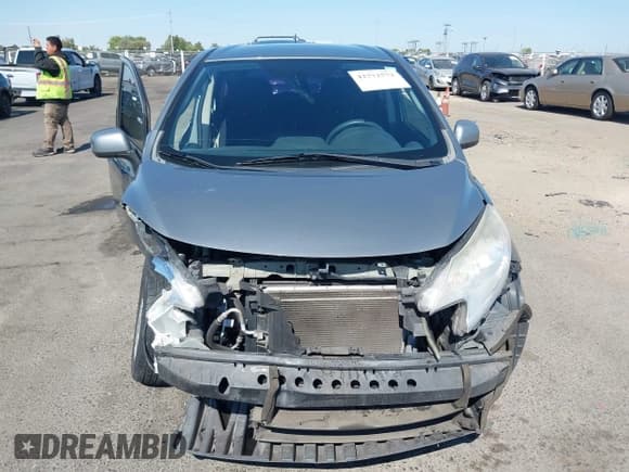✅ 2014 Nissan Note SV • VIN: 3N1CE2CP3EL397672 • Lot: 42772572. Listed on IAAI with 117,789 mi. Free auction sales archive from the USA and detailed vehicle history report at DreamBid. Image 13.
