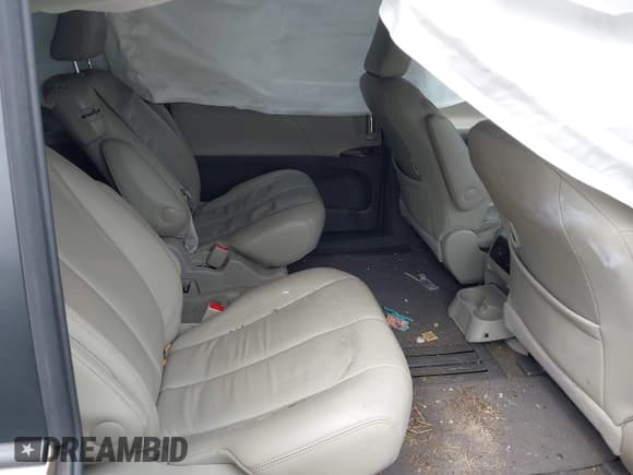 ✅ 2013 Toyota Sienna XLE AAS • VIN: 5TDYK3DC0DS342750 • Lot: 43043478. Listed on IAAI with 131,580 mi. Free auction sales archive from the USA and detailed vehicle history report at DreamBid. Image 8.