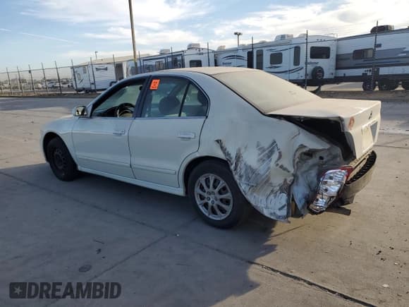 ✅ 2003 Mitsubishi Galant ES • VIN: 4A3AA46G43E124340 • Лот: 74021014. Опубликован ранее на Copart с пробегом 220 226 миль. Бесплатный доступ к архиву аукционных продаж из США и подробный отчёт об истории автомобиля на DreamBid. Изображение 2.