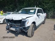 ✅ 2023 Ford F-150 Lightning Pro • VIN: 1FTVW1EL5PWG22503 • Lot: 42825825. Listed on IAAI with 7,030 mi. Free auction sales archive from the USA and detailed vehicle history report at DreamBid. Image 2.
